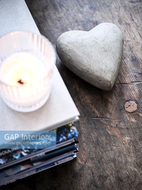 Heart shaped stone on table