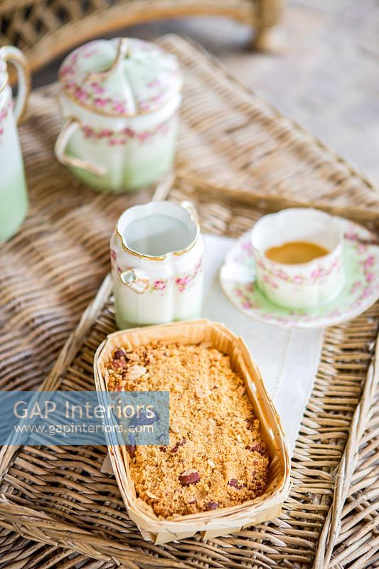 Vintage crockery - tea and cake on wicker tray