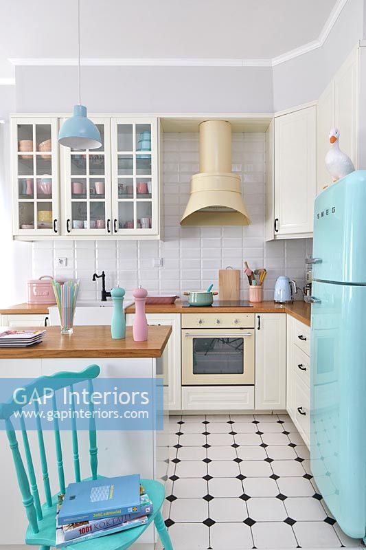 Modern kitchen with pastel accessories 