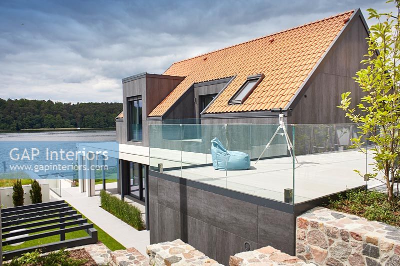 Contemporary lakeside house exterior 