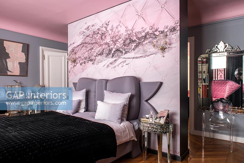 Mural on feature wall of eclectic modern bedroom 