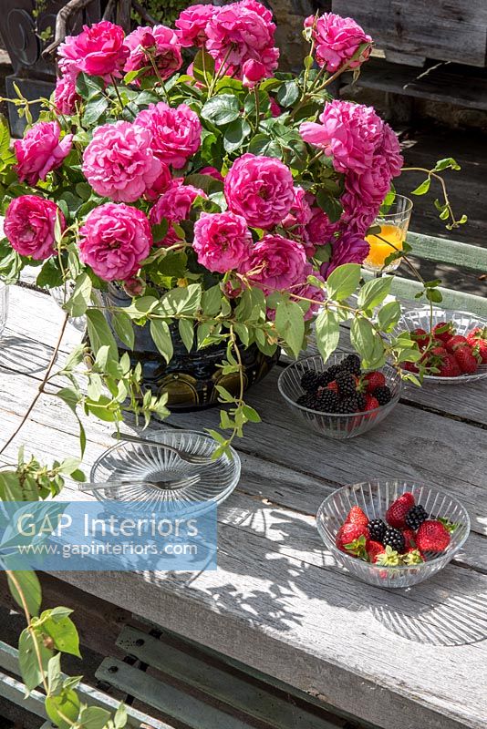 Fruit and flowers on garden table - detail 