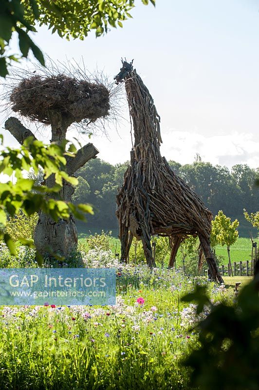 Sculptures in country garden 