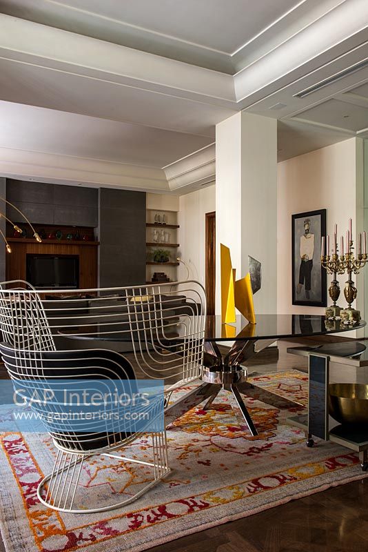 Contemporary metal armchair in modern living room 