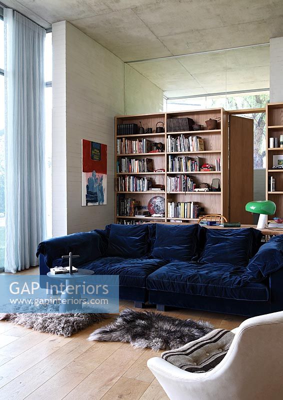 Large blue sofa in modern living room 