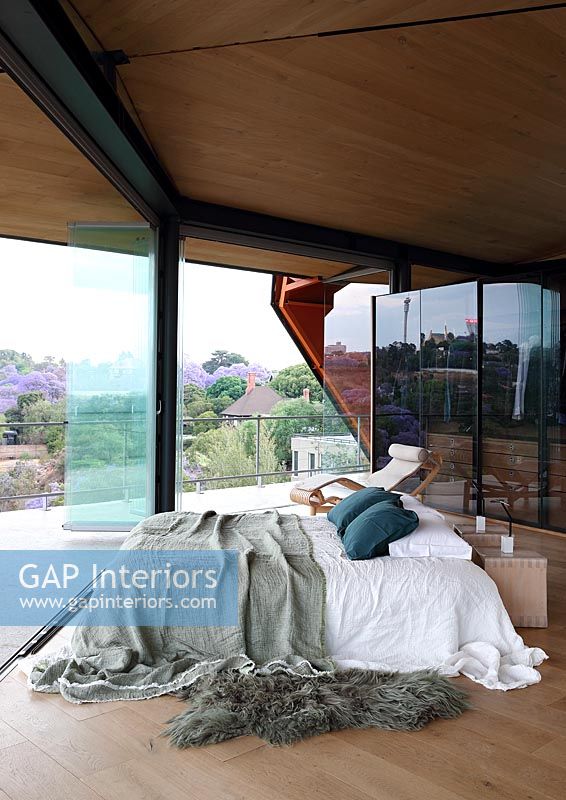 Contemporary bedroom with scenic views