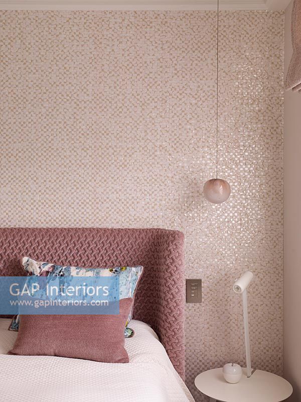 Metallic pink wallpaper in modern bedroom 