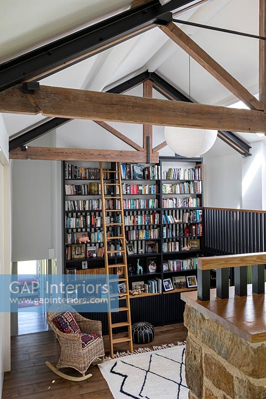 Ladder next to bookshelves in reading room 