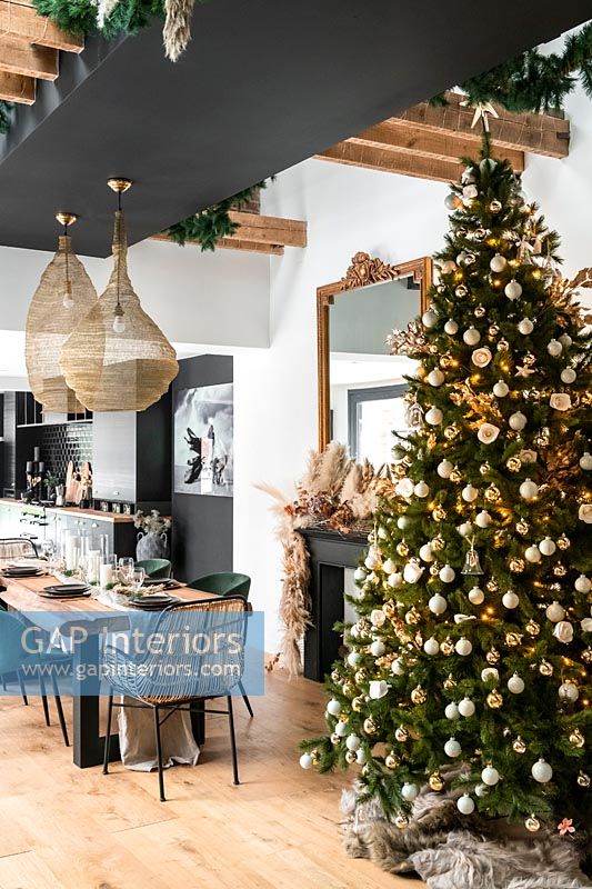 Christmas tree in modern kitchen-diner 