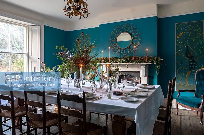 Dining room with blue painted walls - decorated for Christmas 