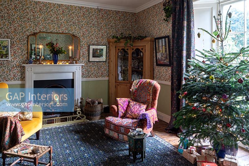 Cosy country living room decorated for Christmas 