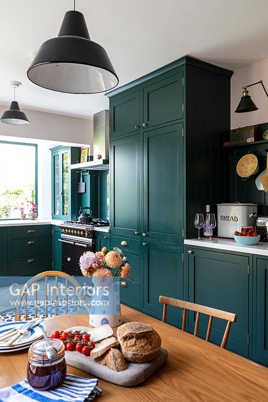 Modern green country style kitchen-diner 