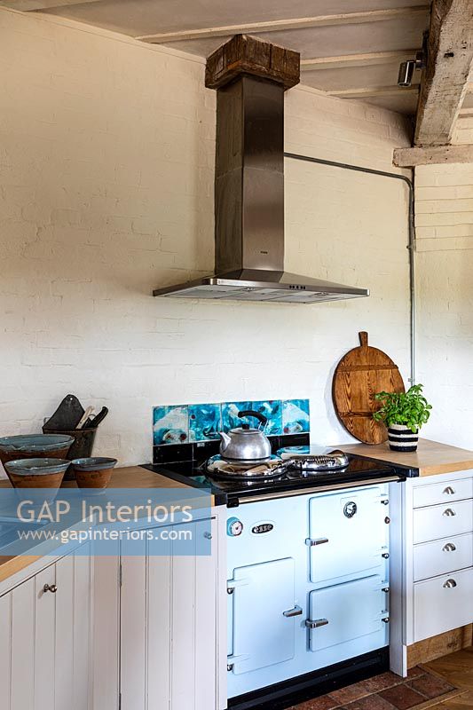 Modern country kitchen with Aga style stove 