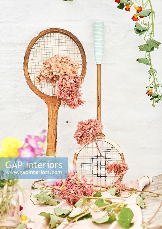 Tennis racquets decorated with flowers 