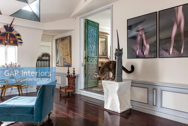 Artwork in modern eclectic living room 