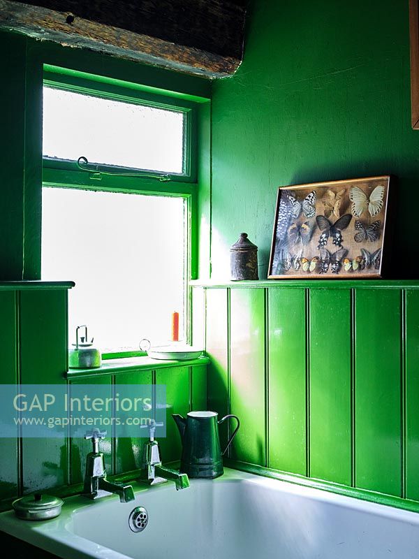 Bright green painted country bathroom 