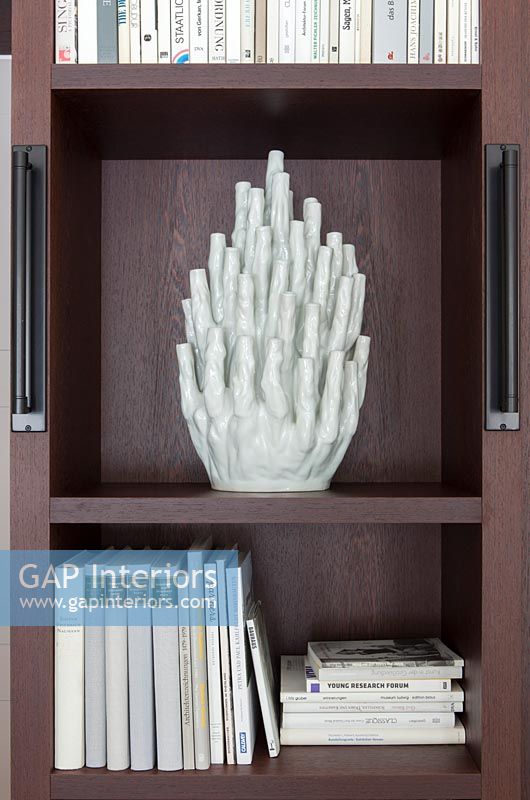 Ceramic sculpture on bookshelf - detail 