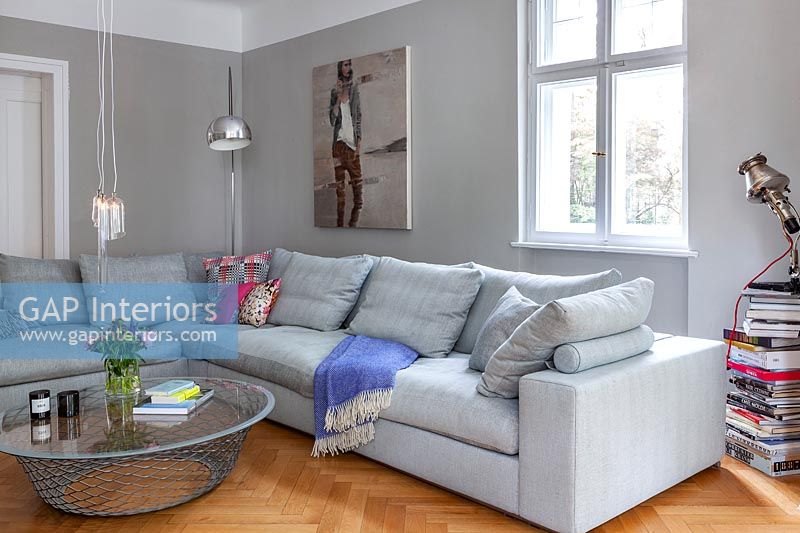 Modern living room with large corner sofa 