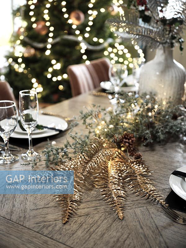 Detail of dining table decorated for Christmas 