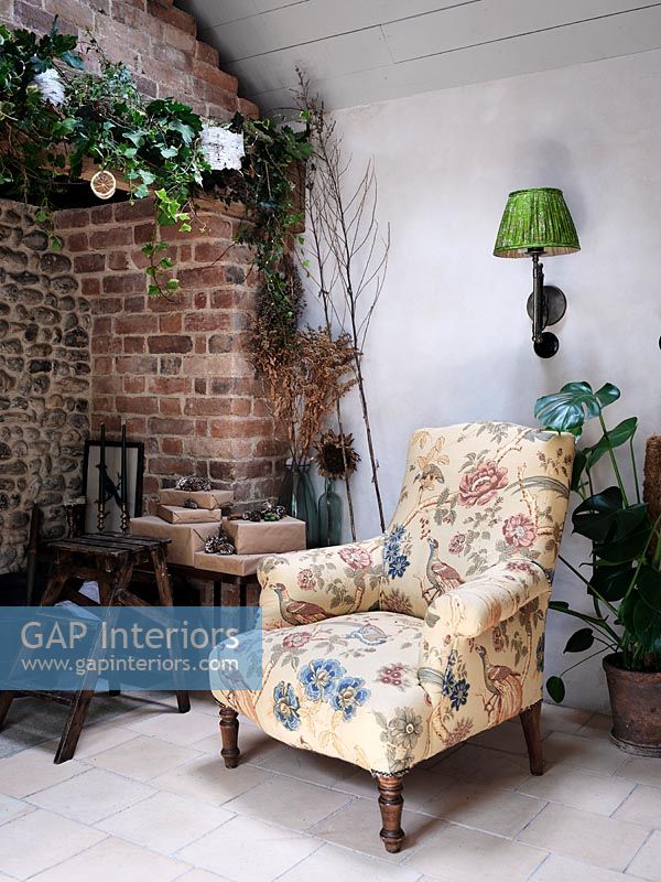 Vintage armchair in country cottage at Christmas time 