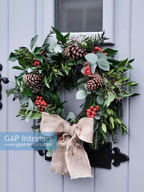 Christmas wreath on front door - exterior 