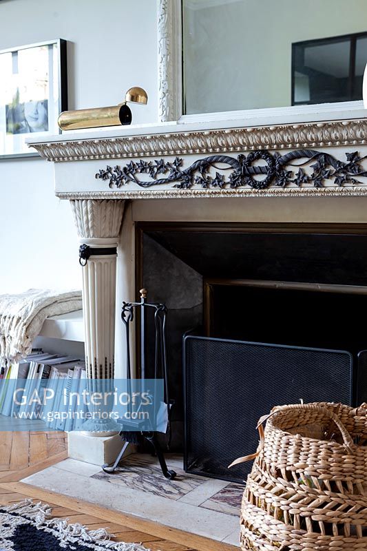 Black and white decorative fireplace surround