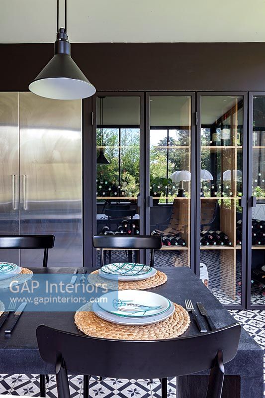 Large wine storage cupboards in modern kitchen-diner 