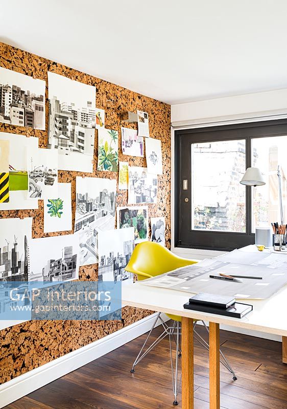 Cork notice board feature wall in modern home office 