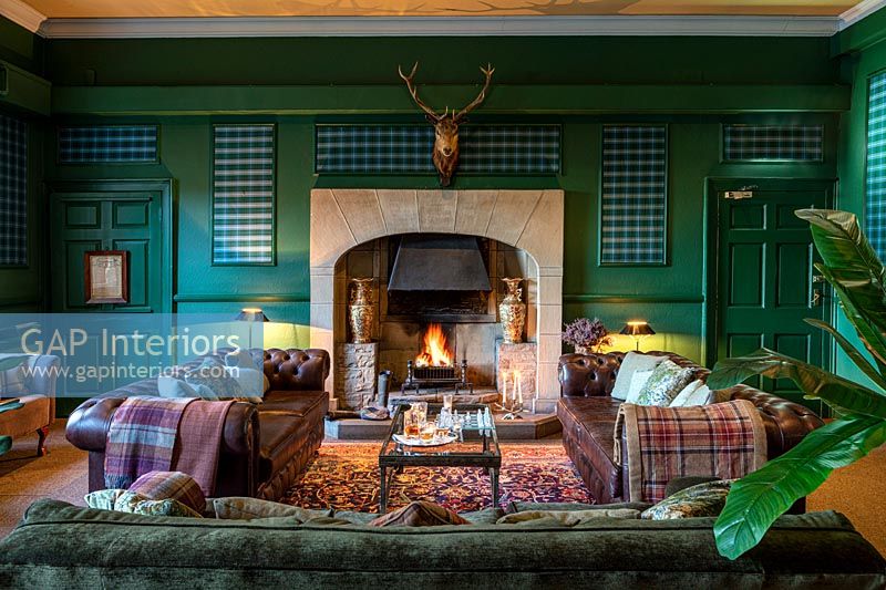 Open fire in country living room  - Swinton Park Hotel, Yorkshire. 