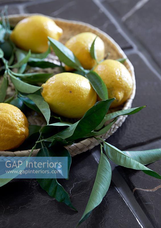 Lemons in basket - kitchen detail 