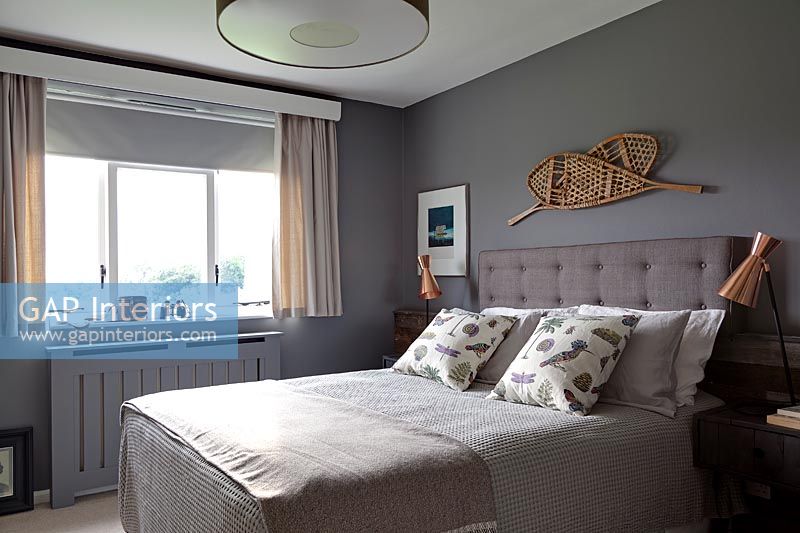 Modern bedroom with grey painted walls