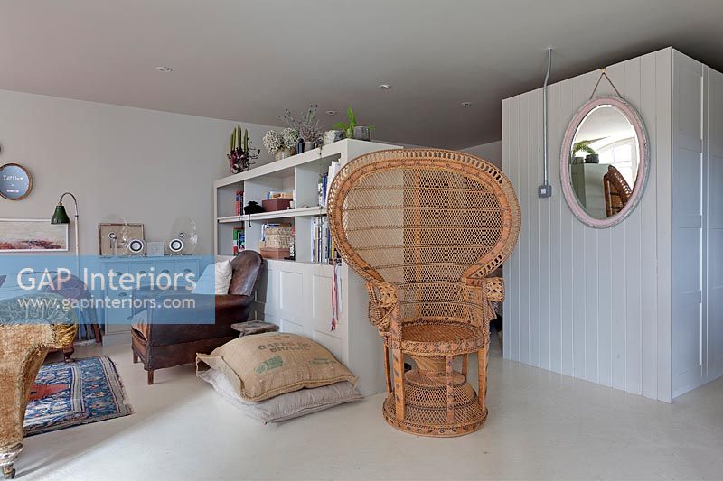 Large wicker chair in modern country living room 