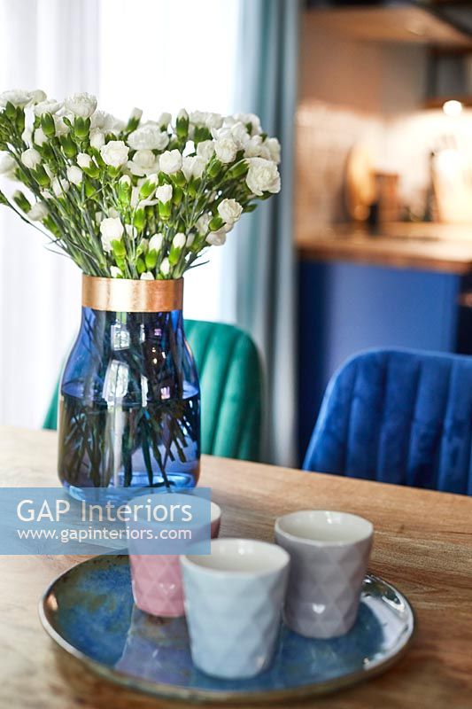 Vase of flowers on dining table