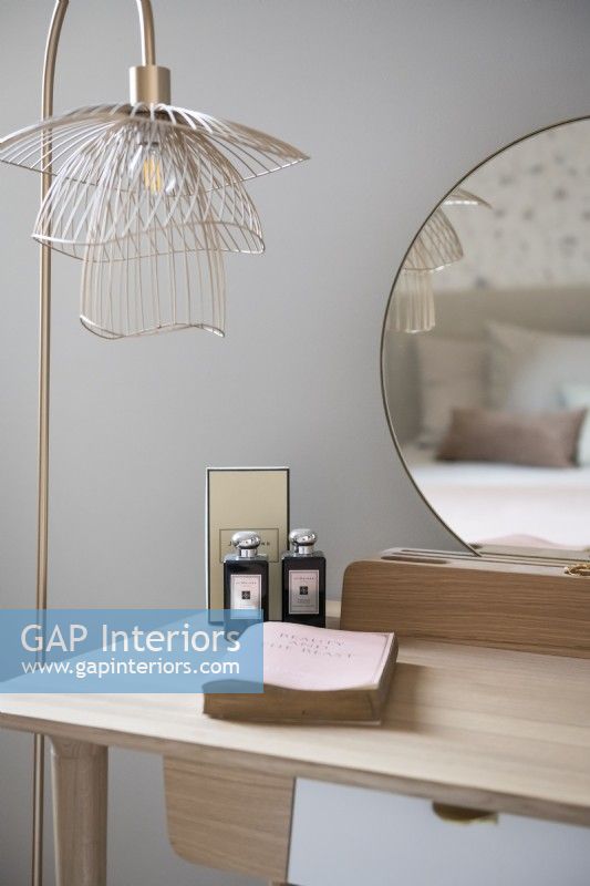 Dressing table and lamp detail in modern bedroom 