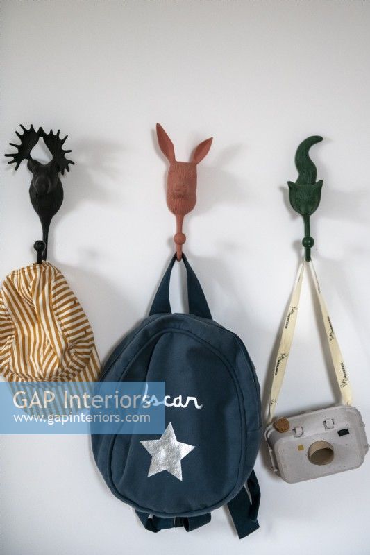 Detail of animal coat hooks and childs accessories 