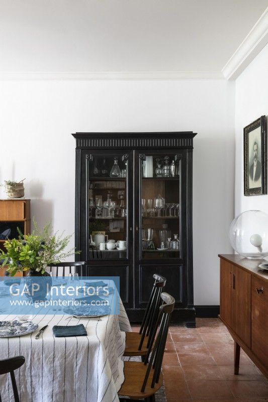 Black classic style dresser in country dining room