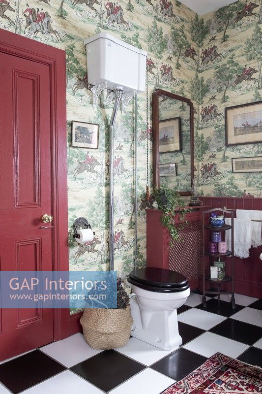 Toilet with cistern in classic bathroom