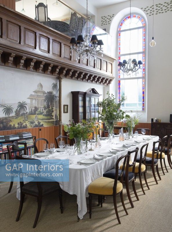 Classic dining room in converted chapel 
