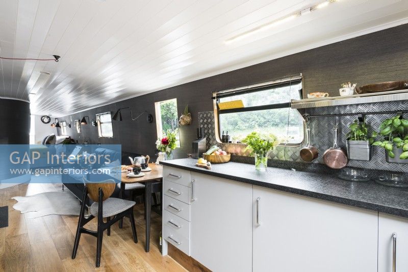 Open plan kitchen living room on canal boat.