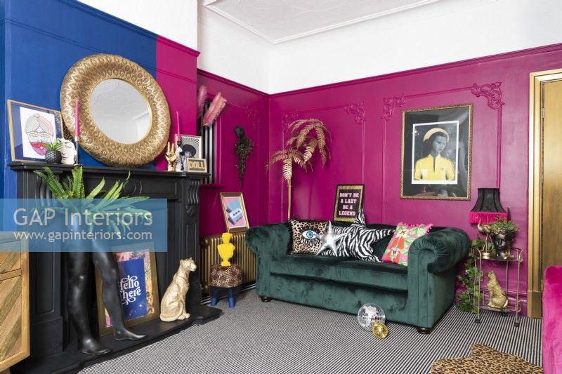 Colourful modern living room with green velvet sofa