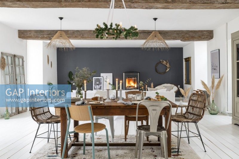 Black feature wall in country living space decorated for Christmas 