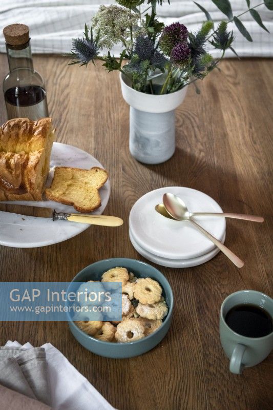 Cake and biscuits on wooden table
