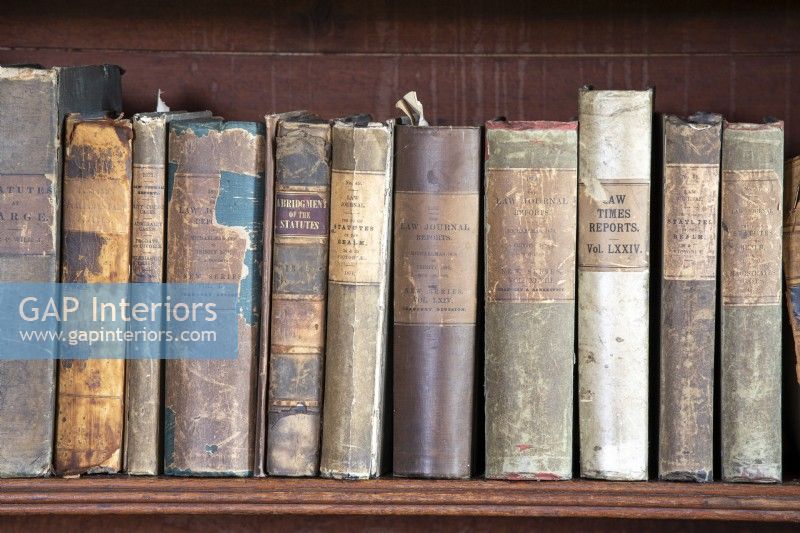 Antique books in an old library in a country house  