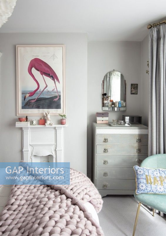 Flamingo painting on wall of modern bedroom