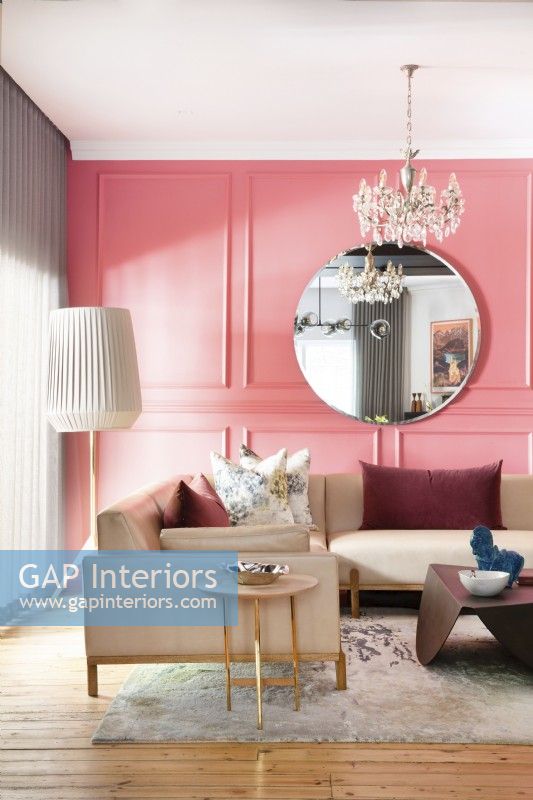 Living room with pink wall panelling