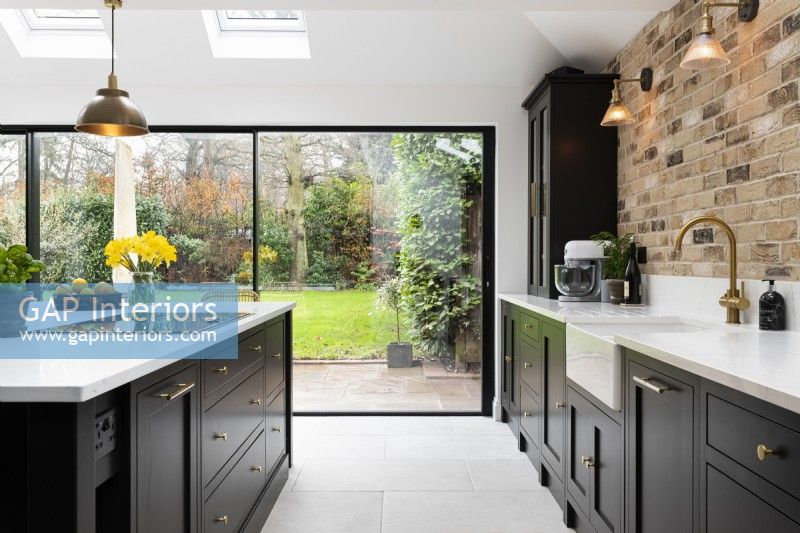 Classic modern kitchen with garden beyond