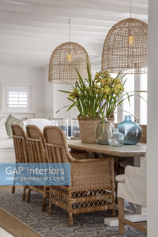 Dining area with rattan pendant lights