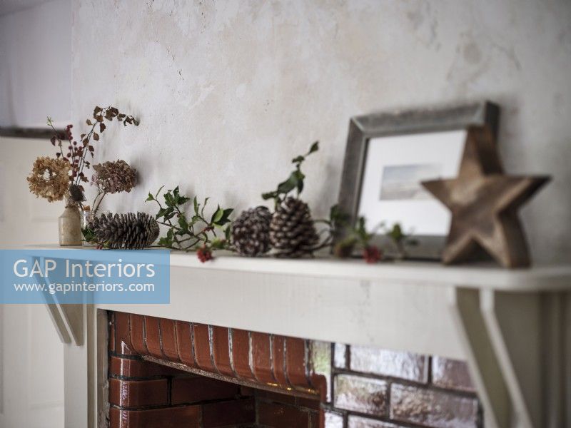 Mantel with rustic Christmas decorations