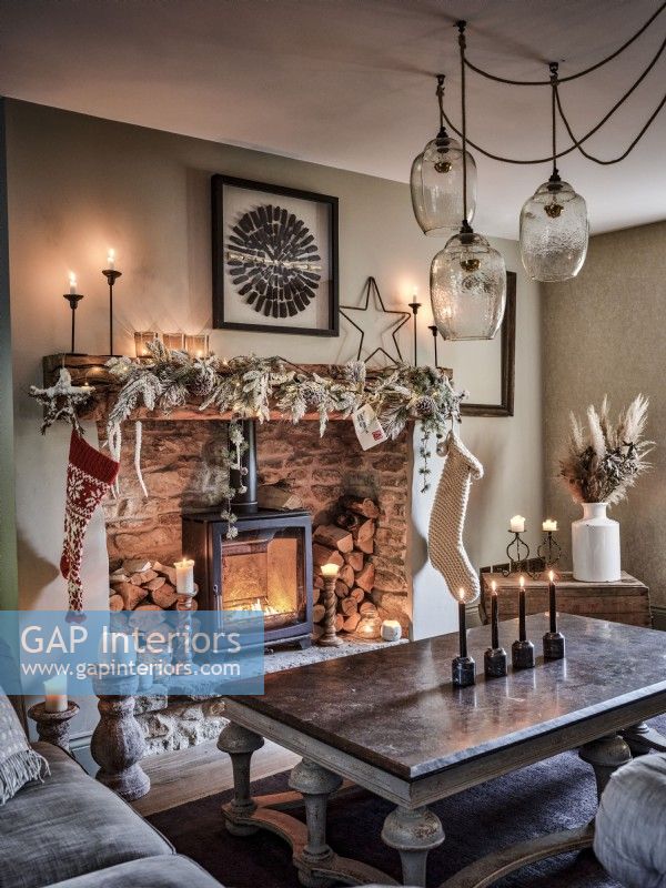 Rustic fireplace with Christmas display
