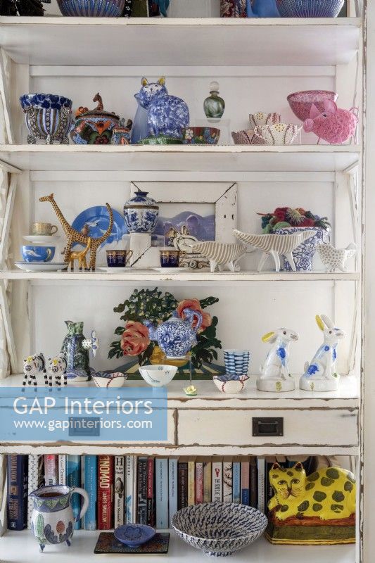 Cabinet displaying quirky collection of ornaments